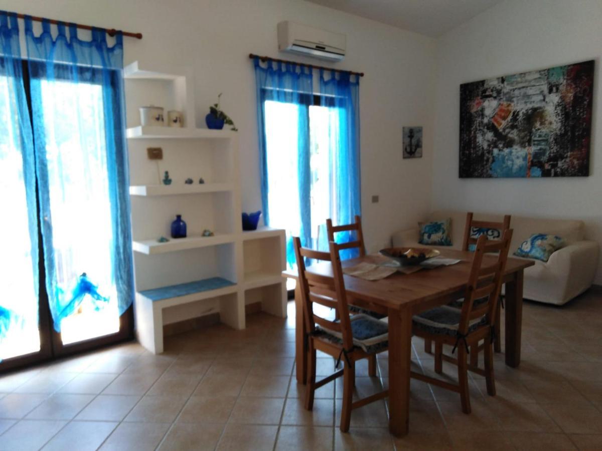 Villa Panoramica Immersa Nel Verde Porto Pino Bagian luar foto