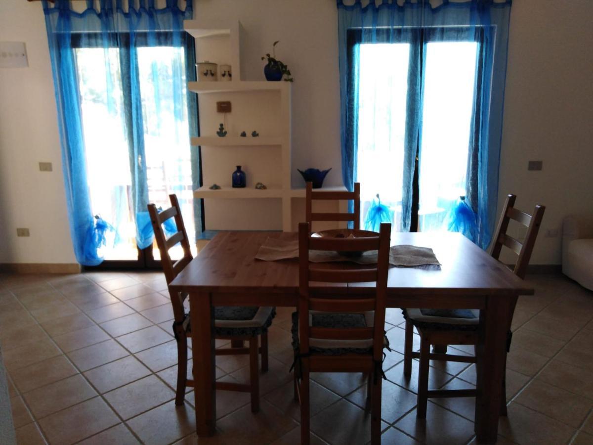 Villa Panoramica Immersa Nel Verde Porto Pino Bagian luar foto