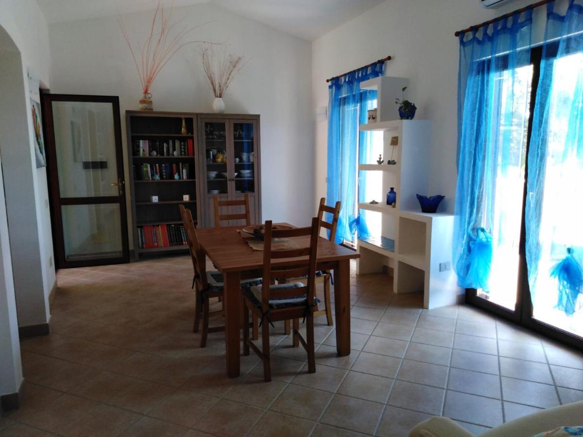 Villa Panoramica Immersa Nel Verde Porto Pino Bagian luar foto