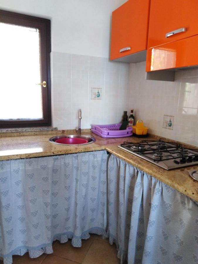 Villa Panoramica Immersa Nel Verde Porto Pino Bagian luar foto